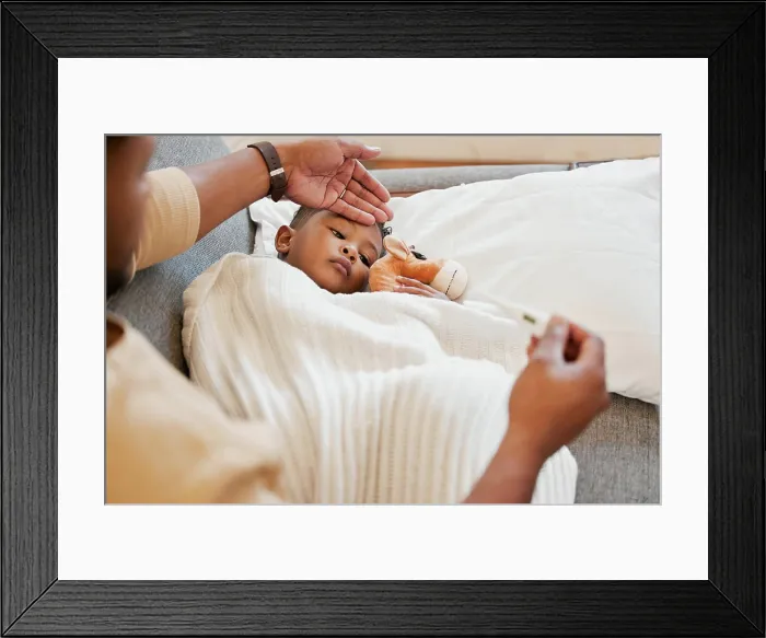 Framed Print : Sick, flu and cold child in bed Framed Print : Sick, flu and cold child in bed
