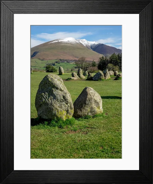 Framed Print : View looking from Castlerigg Stone Circle towards snow topped Blencathra in spring late winter Framed Print : View looking from Castlerigg Stone Circle towards snow topped Blencathra in spring late winter