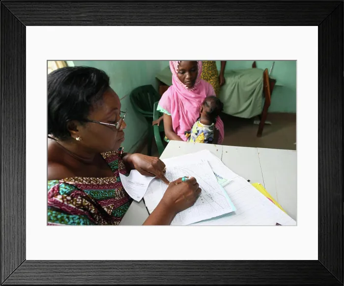 Framed Print : Photo essay in Lomé, Togo. Medical center for HIV patients. Medical consultation Framed Print : Photo essay in Lomé, Togo. Medical center for HIV patients. Medical consultation