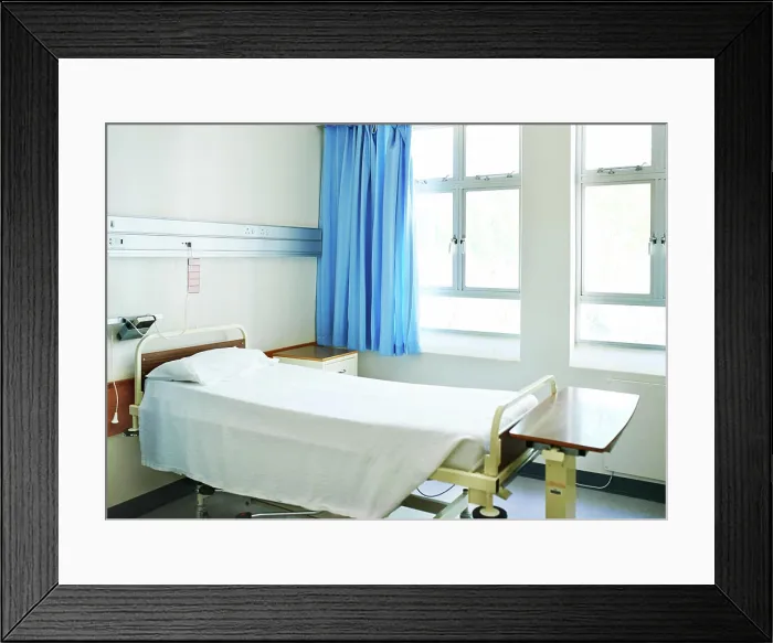 Framed Print : Hospital, healthcare and bed in empty room for healing and consulting for recovery or support Framed Print : Hospital, healthcare and bed in empty room for healing and consulting for recovery or support