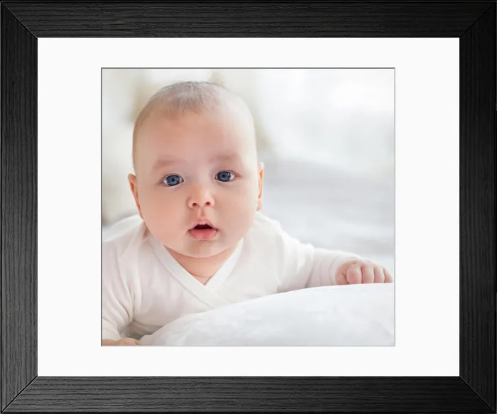 Framed Print : Light close up portrait of adorable baby boy Framed Print : Light close up portrait of adorable baby boy