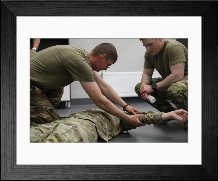 Framed Print : U.S. Army Spc. Jake Gilson, a combat medic assigned to the 1st Infantry Division Artillery