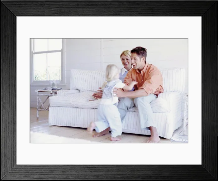 Framed Print : Parents playing with daughter