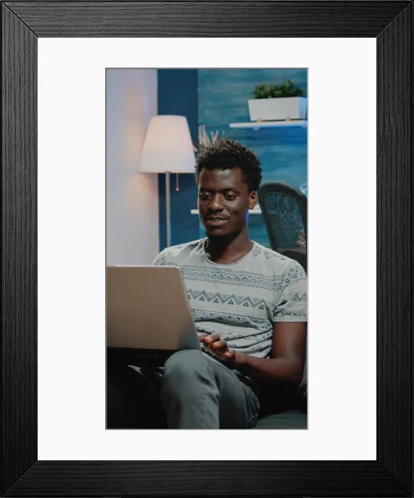 Framed Print : Corporate employee doing online remote work on laptop Framed Print : Corporate employee doing online remote work on laptop