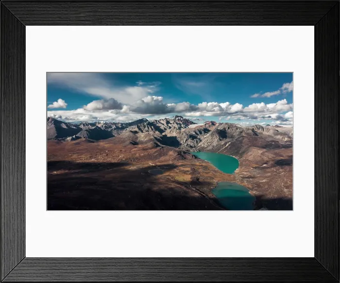 Framed Print : Alpine landscape with turquoise lakes and a mountain range Framed Print : Alpine landscape with turquoise lakes and a mountain range