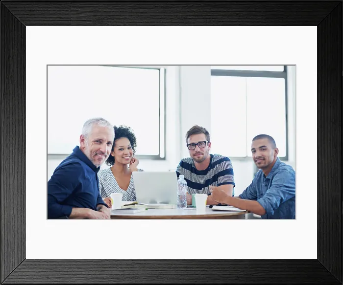 Framed Print : Group, business people and manager with laptop on table Framed Print : Group, business people and manager with laptop on table