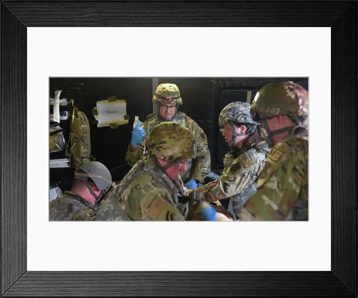 Framed Print : The 111th Medical Group provides aid to a simulated casualty during a readiness exercise on Friday Framed Print : The 111th Medical Group provides aid to a simulated casualty during a readiness exercise on Friday
