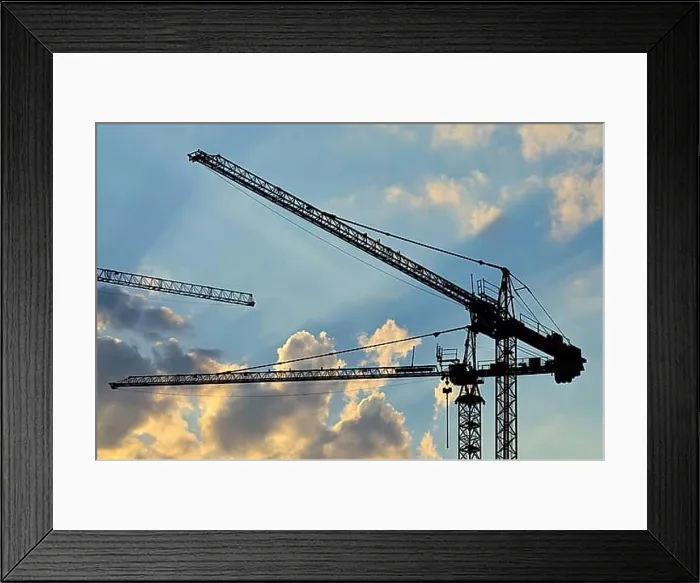 Framed Print : Silhouettes of construction cranes on the sky Framed Print : Silhouettes of construction cranes on the sky