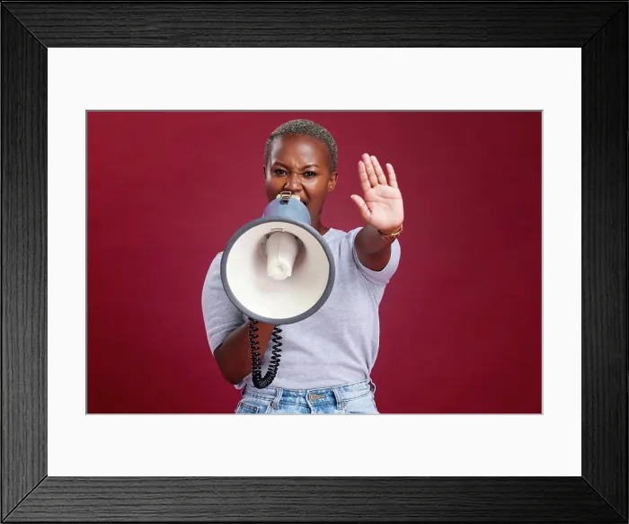 Framed Print : Black woman, protest and shouting with megaphone for voice Framed Print : Black woman, protest and shouting with megaphone for voice