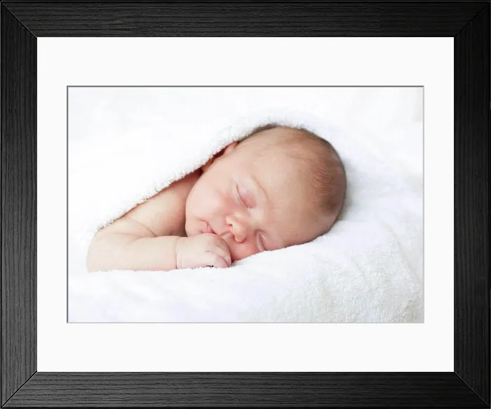 Framed Print : MODEL RELEASED. Newborn baby boy asleep Framed Print : MODEL RELEASED. Newborn baby boy asleep