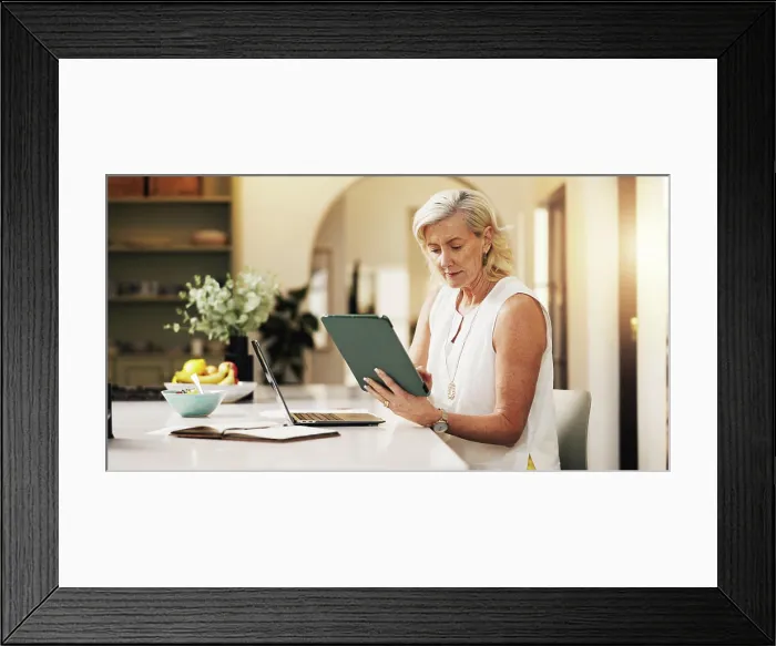 Framed Print : Woman, laptop and reading with tablet for project draft Framed Print : Woman, laptop and reading with tablet for project draft