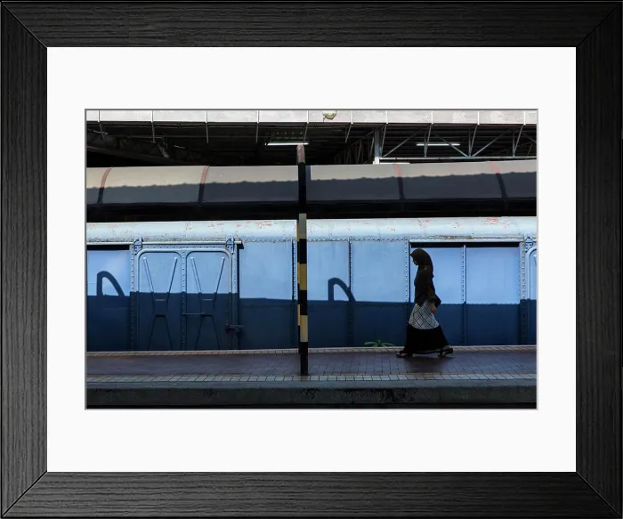Framed Print : Woman Walking at Train Station, Kuala Lumpur, Malaysia Framed Print : Woman Walking at Train Station, Kuala Lumpur, Malaysia