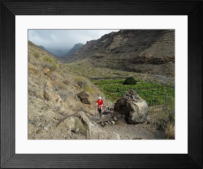 Framed Print : Woman hiking through Barranco de Chinguarime near Playa Santiago Framed Print : Woman hiking through Barranco de Chinguarime near Playa Santiago