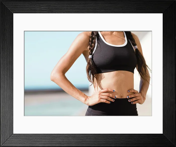 Framed Print : Close up of female athlete belly and hands Framed Print : Close up of female athlete belly and hands