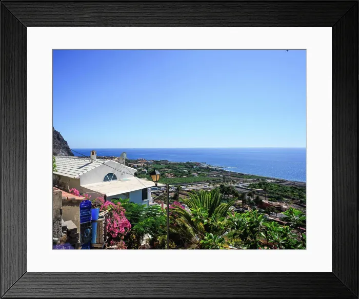 Framed Print : The port town of Valle Gran Rey on the Canary Island of Gomera in the midday sun Framed Print : The port town of Valle Gran Rey on the Canary Island of Gomera in the midday sun