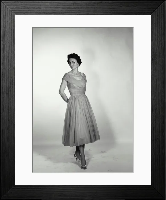Framed Print : Vintage Photograph. Full length of a woman in a dress on white backdrop Framed Print : Vintage Photograph. Full length of a woman in a dress on white backdrop