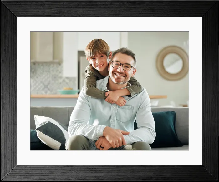 Framed Print : Sofa, son and hugging father in portrait Framed Print : Sofa, son and hugging father in portrait