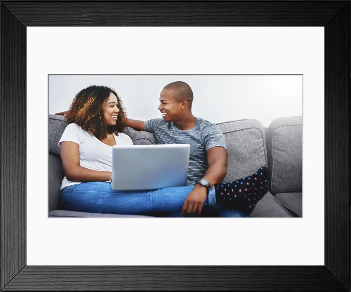 Framed Print : Happy, relax and black couple on laptop online for watching movies Framed Print : Happy, relax and black couple on laptop online for watching movies