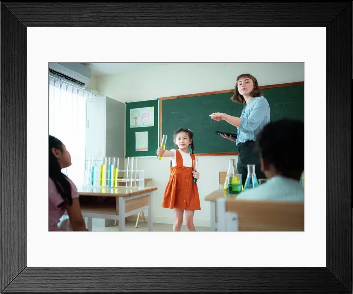 Framed Print : Teacher and students, Learn and experiment with science in a school science classroom Framed Print : Teacher and students, Learn and experiment with science in a school science classroom