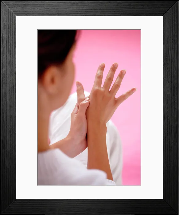 Framed Print : Woman massaging her hands Framed Print : Woman massaging her hands
