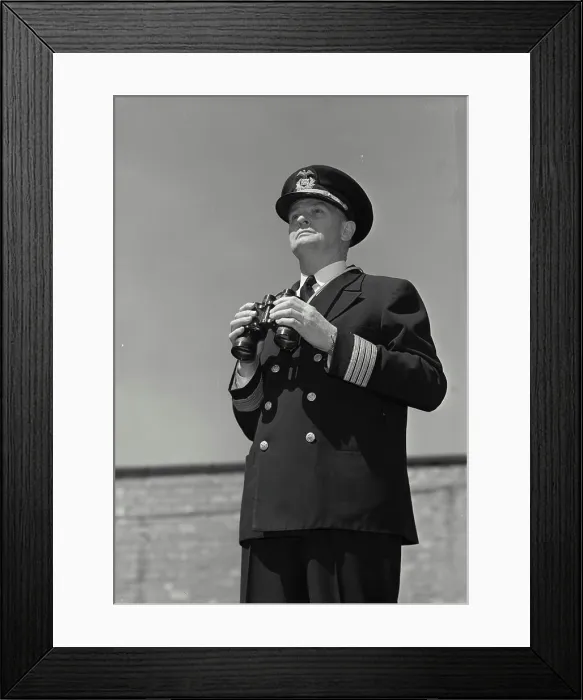 Framed Print : Vintage Photograph. Man in captains uniform standing with binoculars