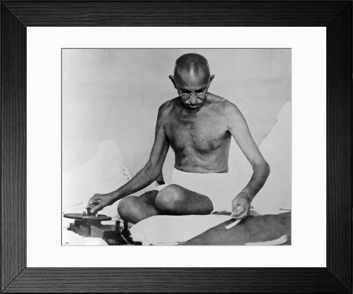 Framed Print : Mohandas Karamchand Gandhi spins cloth using traditional methods; Bombay 1945 Framed Print : Mohandas Karamchand Gandhi spins cloth using traditional methods; Bombay 1945