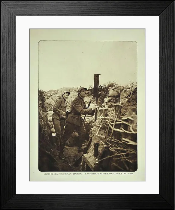 Framed Print : Soldier in trench checking with periscope where grenades strike in the battlefield at Diksmuide in Flanders during WWI