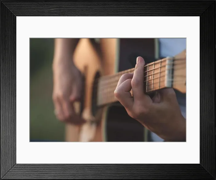 Framed Print : Woman's hands playing acoustic guitar Framed Print : Woman's hands playing acoustic guitar