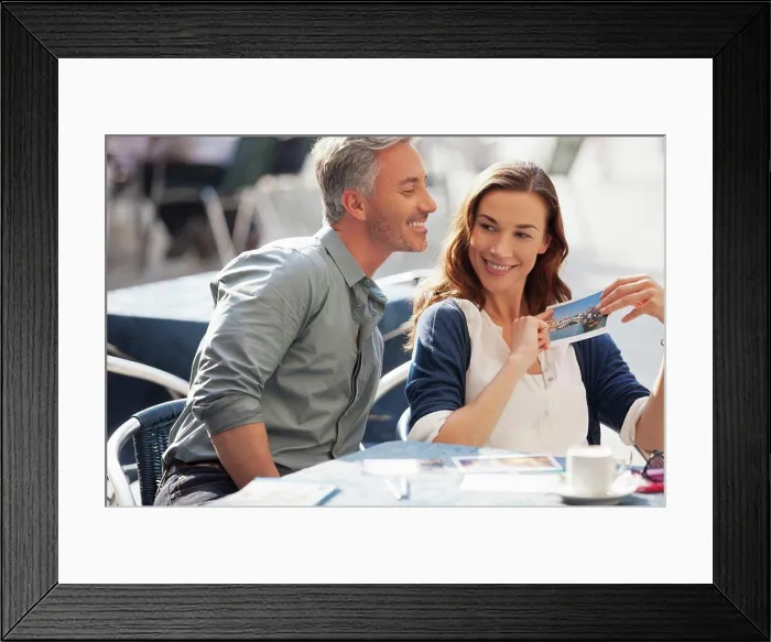 Framed Print : Venice, Smiling couple with postcard at sidewalk cafe Framed Print : Venice, Smiling couple with postcard at sidewalk cafe
