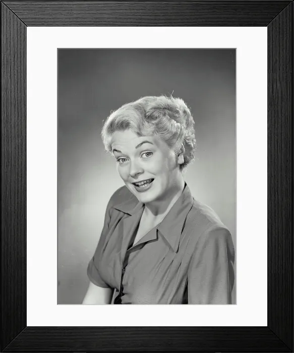 Framed Print : Vintage photograph. Portrait of woman in collared blouse smiling at camera
