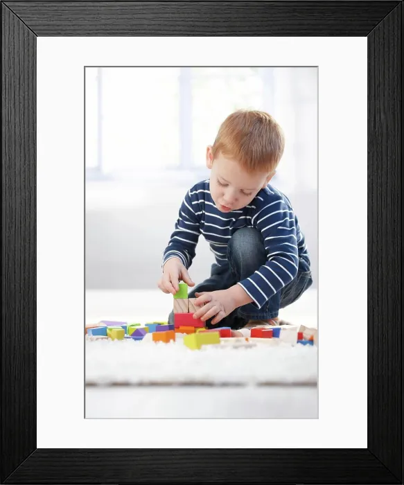 Framed Print : Ginger-haired little boy playing at home Ginger-haired little boy playing at home with building cubes Framed Print : Ginger-haired little boy playing at home Ginger-haired little boy playing at home with building cubes