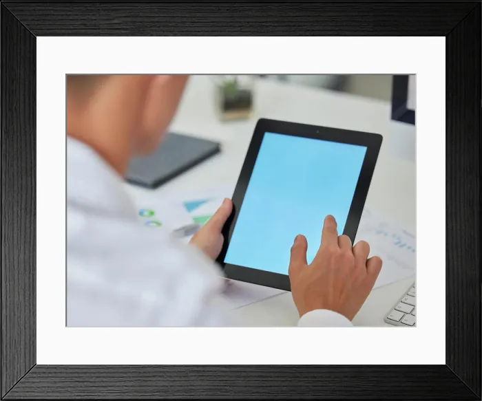 Framed Print : Tablet screen, mockup and hands of business man in office for website