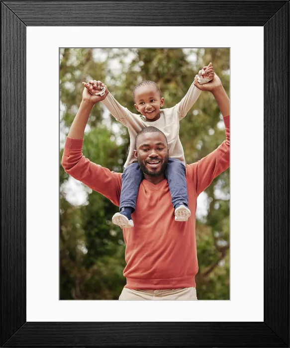 Framed Print : A young black father playing with his daughter happy Framed Print : A young black father playing with his daughter happy