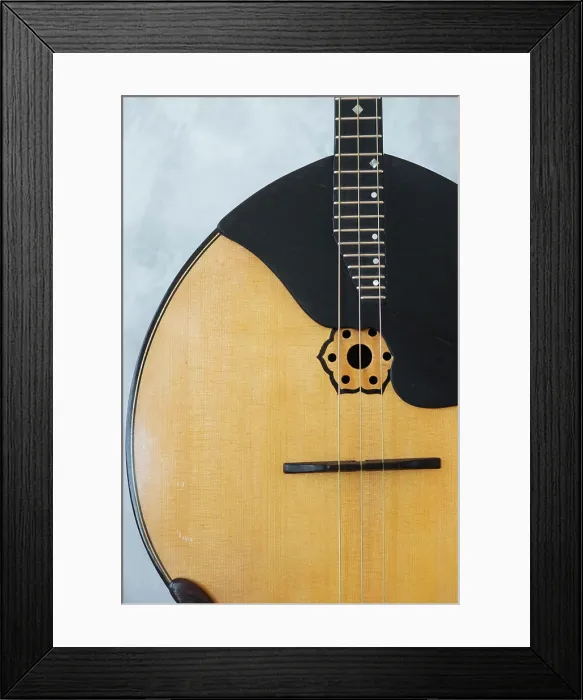 Framed Print : Classic wooden banjo against wall Framed Print : Classic wooden banjo against wall