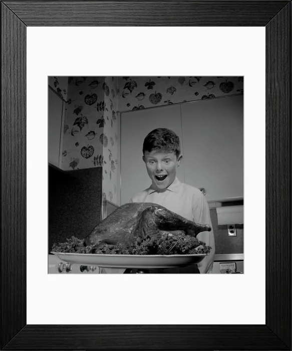 Framed Print : Boy looking at roast turkey Framed Print : Boy looking at roast turkey
