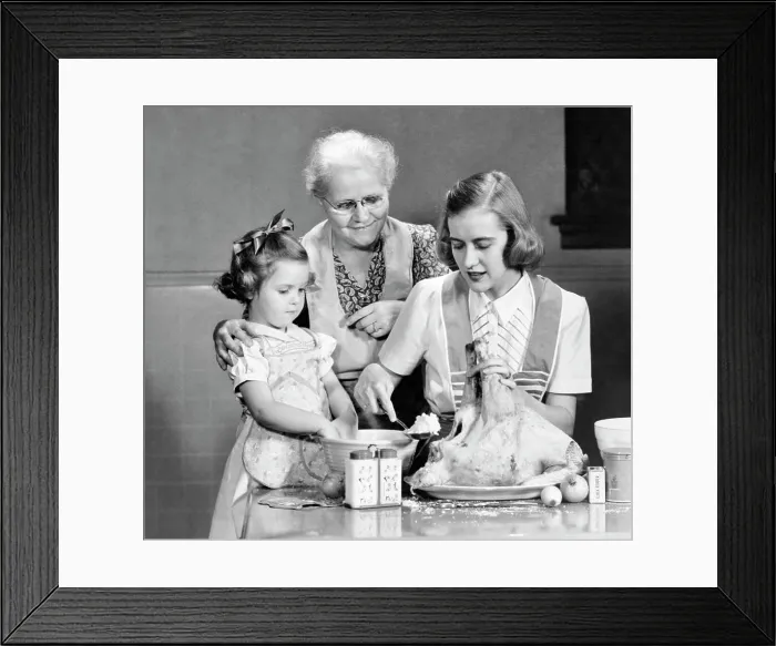 Framed Print : 1940s 1950s MOTHER DAUGHTER GRANDMOTHER STUFFING THANKSGIVING TURKEY Framed Print : 1940s 1950s MOTHER DAUGHTER GRANDMOTHER STUFFING THANKSGIVING TURKEY