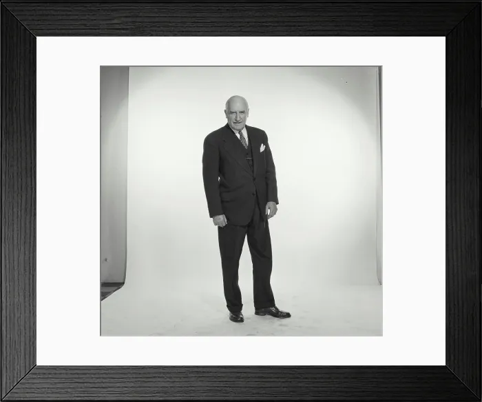 Framed Print : Portrait of a businessman smiling Framed Print : Portrait of a businessman smiling