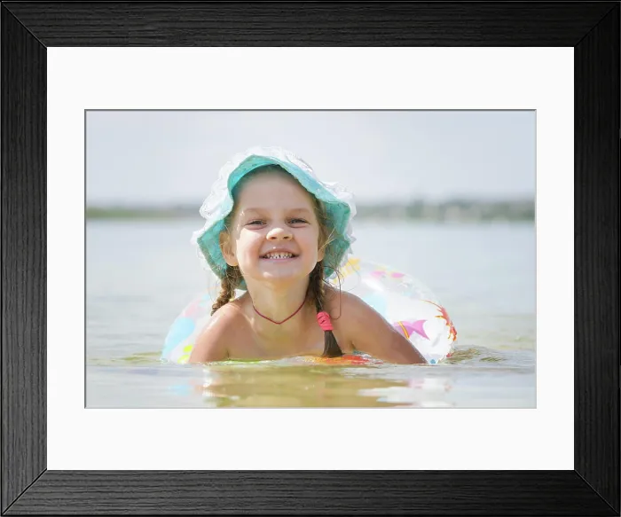 Framed Print : Four-year girl bathes in the river Four-year girl with the Europeans bathed swimming laps in the river Framed Print : Four-year girl bathes in the river Four-year girl with the Europeans bathed swimming laps in the river