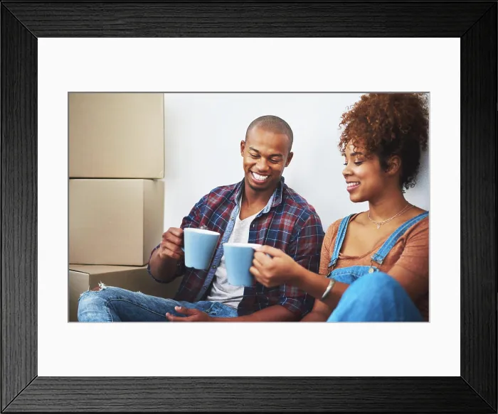 Framed Print : Couple, smile and coffee in new house with boxes for moving Framed Print : Couple, smile and coffee in new house with boxes for moving