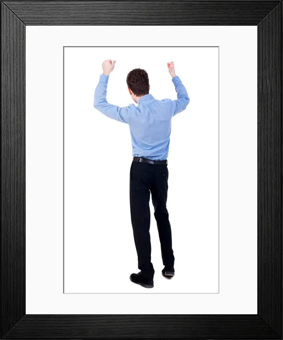 Framed Print : Back view of man. Raised his fist up in victory sign Framed Print : Back view of man. Raised his fist up in victory sign