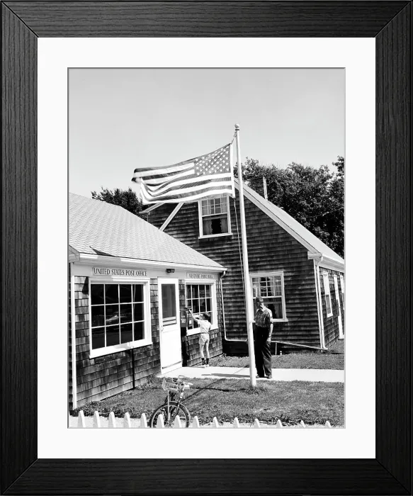Framed Print : USA, Massachusetts, Westport, Boy dropping mail in mailbox with mature man standing behind him