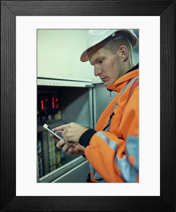 Framed Print : Power, phone and man in electricity maintenance Framed Print : Power, phone and man in electricity maintenance