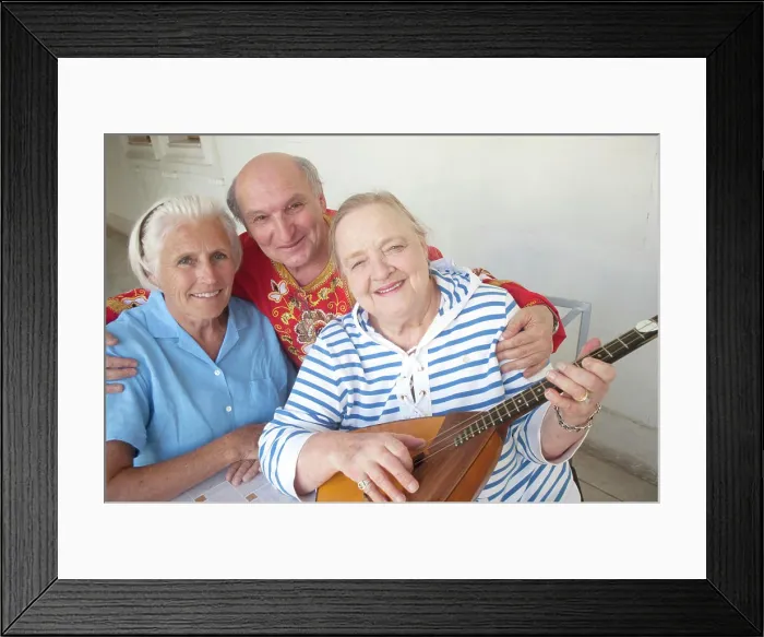 Framed Print : Overseas visitors with musician in folk attire become best friends at a concert in the Inner Gardens of the Livadia Framed Print : Overseas visitors with musician in folk attire become best friends at a concert in the Inner Gardens of the Livadia