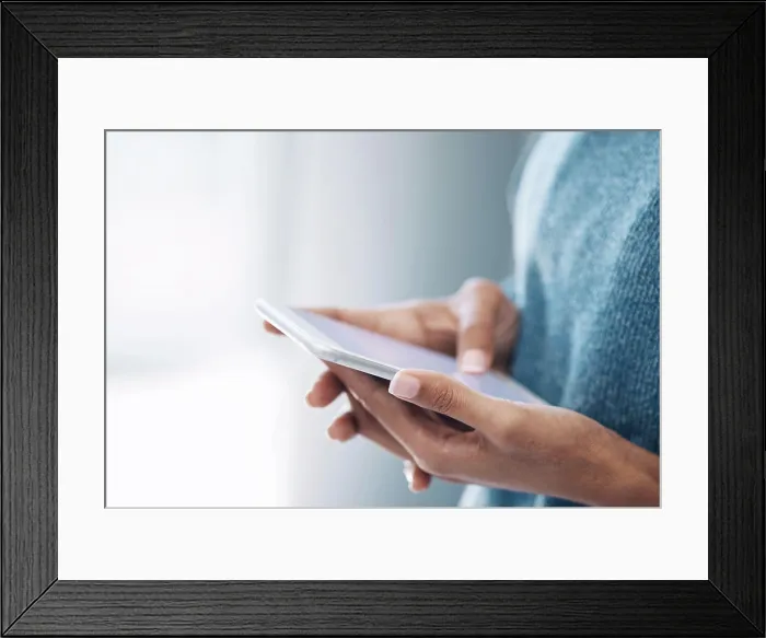 Framed Print : Hands, phone and woman texting on mockup for internet