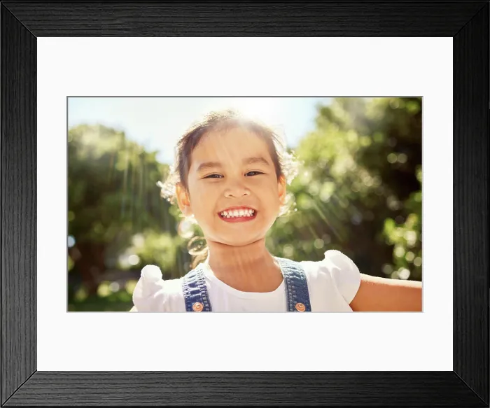 Framed Print : Summer, sunshine and portrait of Asian child in the park smile on face Framed Print : Summer, sunshine and portrait of Asian child in the park smile on face