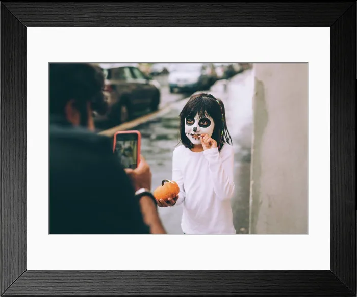 Framed Print : Father photographing daughter at Halloween Framed Print : Father photographing daughter at Halloween