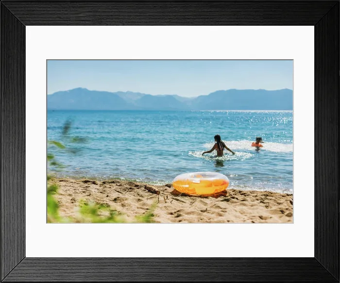 Framed Print : Swimming in a Mountain Lake with Blue Skies and an Orange Inflatable Framed Print : Swimming in a Mountain Lake with Blue Skies and an Orange Inflatable