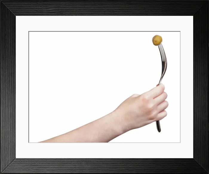 Framed Print : hand holds fork with impaled green olive isolated hand holds fork with impaled green olive isolated on white background Framed Print : hand holds fork with impaled green olive isolated hand holds fork with impaled green olive isolated on white background