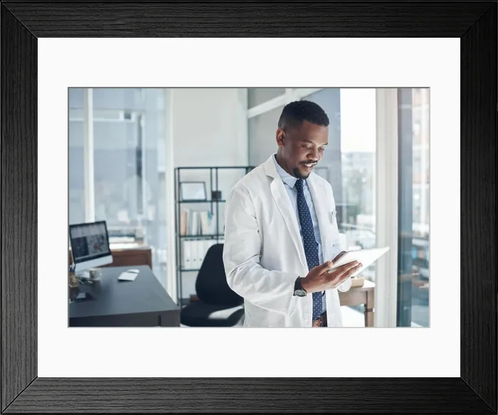 Framed Print : Reading, doctor and black man with tablet Framed Print : Reading, doctor and black man with tablet