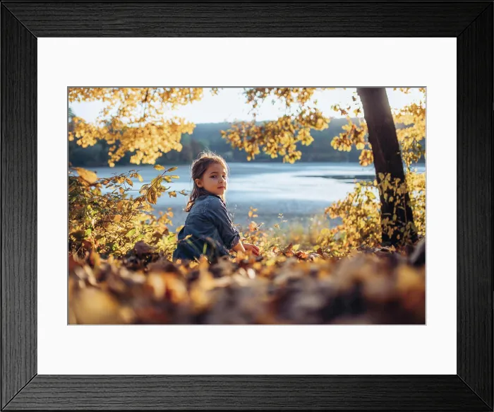 Framed Print : Girl in autumn nature, sitting on fallen leaves Framed Print : Girl in autumn nature, sitting on fallen leaves